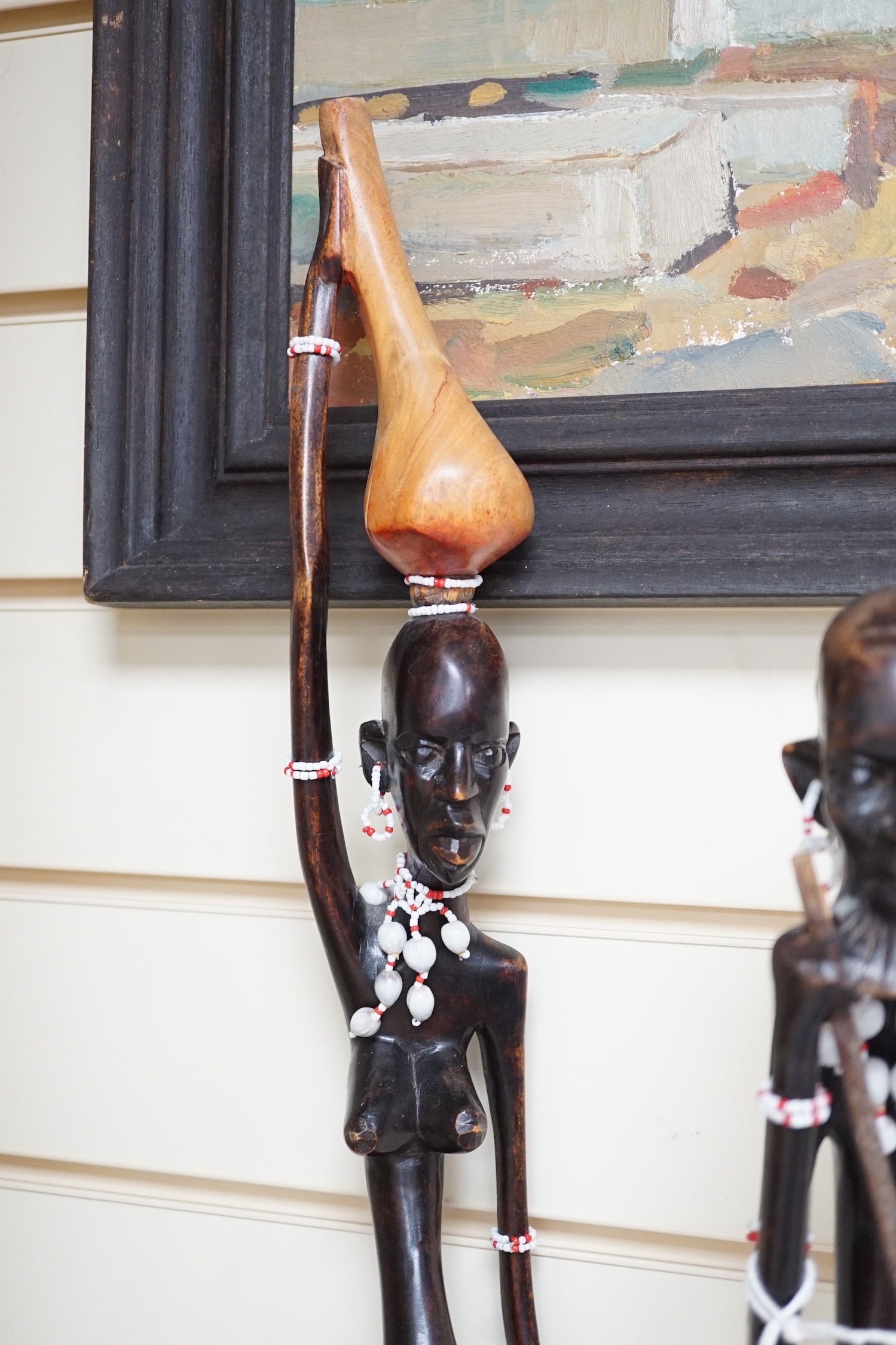 Two African carved wood figures, tallest 92cm